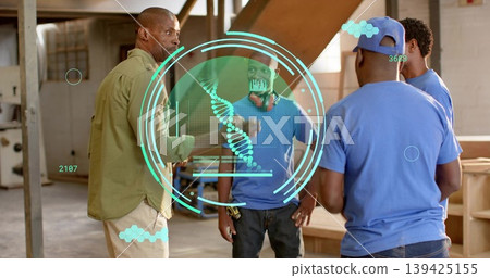 Fist bumping supervisor in olive-green shirt with team in blue in woodshop, showing DNA helix Fist bumping supervisor in olive-green shirt with team in blue in woodshop, showing DNA helix 139425155