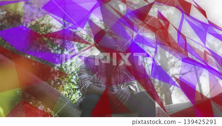 Sitting man wearing plaid shirt and jeans, gazing amid purple abstract overlays in sunlit forest Sitting man wearing plaid shirt and jeans, gazing amid purple abstract overlays in sunlit forest 139425291