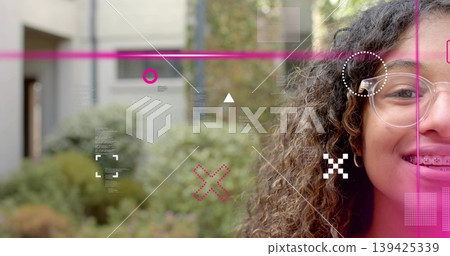 Smiling teenage girl with clear glasses and braces posing in courtyard, magenta overlay copy space 139425339