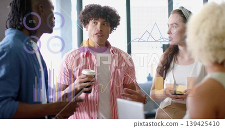 Four professionals discussing digital chart overlays in modern office meeting area, with laptop Four professionals discussing digital chart overlays in modern office meeting area, with laptop 139425410