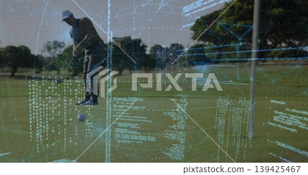 Leaning golfer in cap striking golf ball on fairway, with putter and code projections, copy space 139425467
