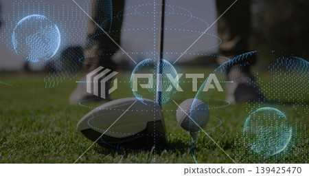 Aligning driver club head behind golf ball on wooden tee at golf course, with holographic overlays Aligning driver club head behind golf ball on wooden tee at golf course, with holographic overlays 139425470