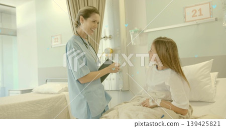 Nurse in scrubs and stethoscope holding clipboard talking with child at hospital bed, with IV drip Nurse in scrubs and stethoscope holding clipboard talking with child at hospital bed, with IV drip 139425821