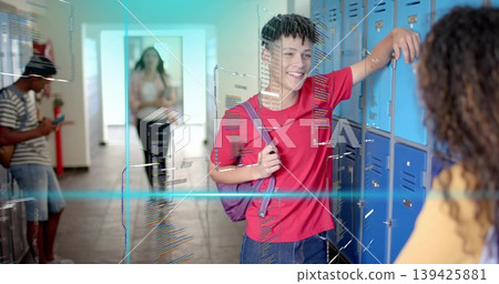 Leaning teenage boy in red t-shirt carrying purple backpack chatting and smiling by school lockers Leaning teenage boy in red t-shirt carrying purple backpack chatting and smiling by school lockers 139425881