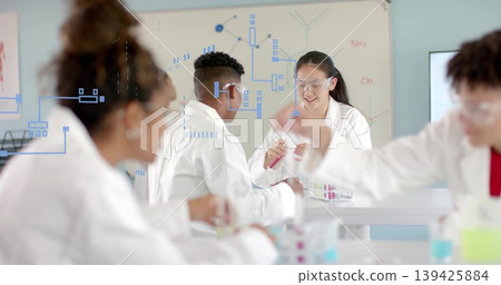 Holding pink test tube, Chinese girl smiling at school lab bench with whiteboard diagrams 139425884
