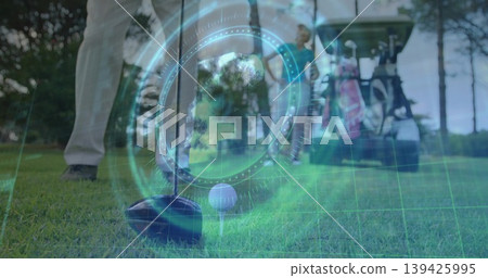 Featuring golf club driver head hovering behind ball on tee on fairway, hologram globe grid overlay Featuring golf club driver head hovering behind ball on tee on fairway, hologram globe grid overlay 139425995