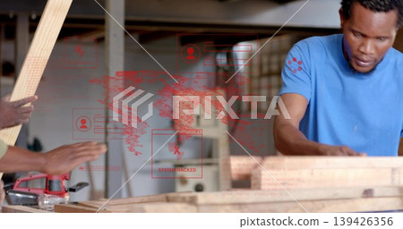 Operating man wearing blue t-shirt cutting plank at wood shop, with SYSTEM HACKED alert, copy space 139426356