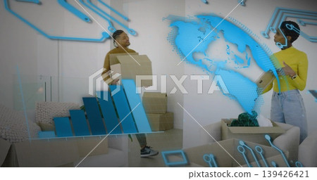 Holding cardboard boxes, mid-adult woman and man in home with beige sofa, digital overlays Holding cardboard boxes, mid-adult woman and man in home with beige sofa, digital overlays 139426421
