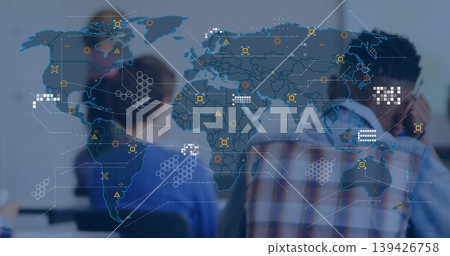 Watching students following world map projection in classroom, with data icons overlay 139426758
