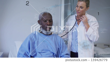 Examining doctor in white coat using stethoscope on patient back in hospital with privacy curtain 139426779