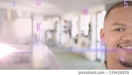 Smiling man wearing collared shirt in office corridor with purple overlays, lens flare, copy space 139426859