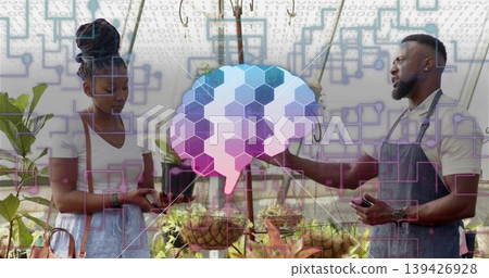 Examining woman in white and man in apron holding potted plant at nursery, brain-circuit overlay Examining woman in white and man in apron holding potted plant at nursery, brain-circuit overlay 139426928