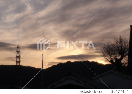 A quiet evening descends upon the foothills. A calm sky signals the end of the day. A quiet evening descends upon the foothills. A calm sky signals the end of the day. 139427425