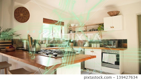 Showing wooden island with gas cooktop glowing under neon-green hologram in bright kitchen, kettle Showing wooden island with gas cooktop glowing under neon-green hologram in bright kitchen, kettle 139427634
