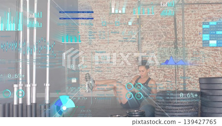 Stretching woman in athletic wear on gym mat, surrounded by stacked bumper plates and AR overlays Stretching woman in athletic wear on gym mat, surrounded by stacked bumper plates and AR overlays 139427765