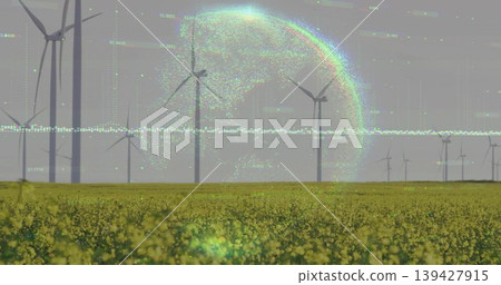 Showing row of modern wind turbines spinning over yellow crop field, with holographic data overlay 139427915