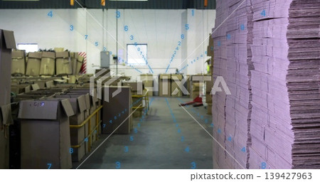 Showing warehouse worker in safety vest checking boxes, tall cardboard stack right, copy space Showing warehouse worker in safety vest checking boxes, tall cardboard stack right, copy space 139427963