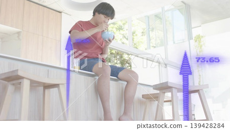 Eating Asian man in red shirt and shorts at counter, eating from bowl with purple overlays Eating Asian man in red shirt and shorts at counter, eating from bowl with purple overlays 139428284