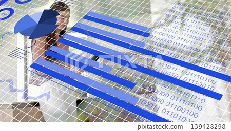 Viewing woman wearing white blazer patterned top at desk, with blue charts, binary grid, copy space Viewing woman wearing white blazer patterned top at desk, with blue charts, binary grid, copy space 139428298