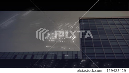 Reflecting glass high-rise facade showing window grid and LED dots street-level, copy space Reflecting glass high-rise facade showing window grid and LED dots street-level, copy space 139428429