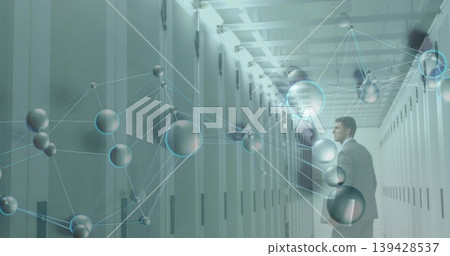 Inspecting man in gray suit standing by server racks in data center, network overlay, copy space Inspecting man in gray suit standing by server racks in data center, network overlay, copy space 139428537