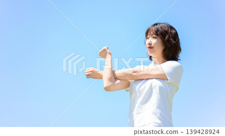 Women doing stretches / sports Women doing stretches / sports 139428924