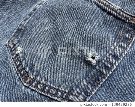 Denim pockets with holes Denim pockets with holes 139429286