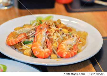dry prawn noodles or stir fried noodles or pad thai , noodles without soup or Thai food or dry noodles or prawn noodles dry prawn noodles or stir fried noodles or pad thai , noodles without soup or Thai food or dry noodles or prawn noodles 139430588