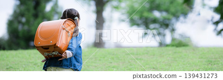 A full-body portrait of an energetic elementary school student running with a schoolbag, depicting the image of a young elementary school student going to and from school, and their growth. A full-body portrait of an energetic elementary school student running with a schoolbag, depicting the image of a young elementary school student going to and from school, and their growth. 139431273