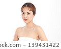 A beautiful young Asian woman with clean, fresh skin against a white background. Skincare, facial treatment, cosmetology, beauty, and spa. An elegant portrait of an Asian woman. 139431422