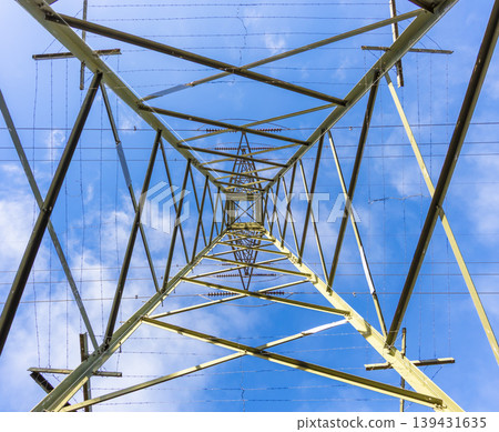 Looking up through the internal steel structure of a transmission tower Looking up through the internal steel structure of a transmission tower 139431635