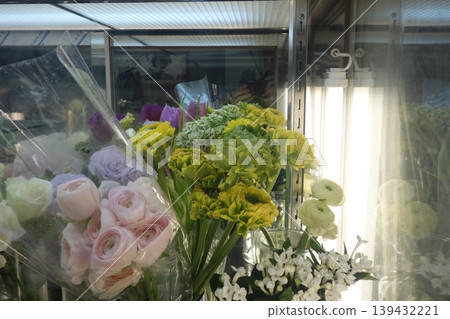 Floral Arrangement in a Flower Shop Window 139432221