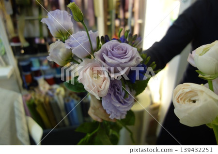 Elegant Purple and White Flower Bouquet in Floral Shop 139432251