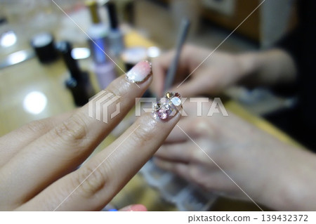 Close-up of Nail Art Application in Beauty Salon Close-up of Nail Art Application in Beauty Salon 139432372