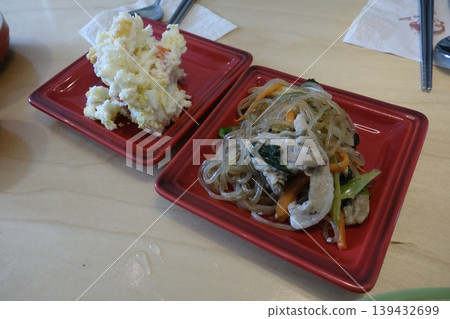 Two Red Plates with Asian Cuisine Dishes Two Red Plates with Asian Cuisine Dishes 139432699