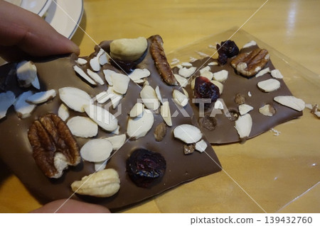 Chocolate Bar with Nuts and Dried Fruits 139432760