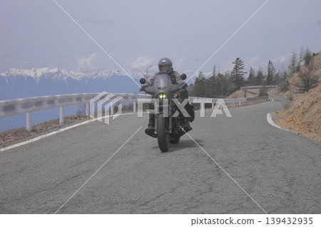 A motorcycle ride along the Utsukushigahara Skyline with the Hakuba mountain range in the background 139432935