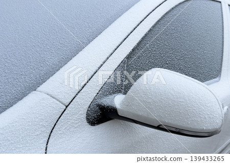 Winter's icy touch blankets a car, its windows veiled in a delicate frost. Crisp winter days bring the beauty of the season, but also challenges for the daily commute. Winter's icy touch blankets a car, its windows veiled in a delicate frost. Crisp winter days bring the beauty of the season, but also challenges for the daily commute. 139433265