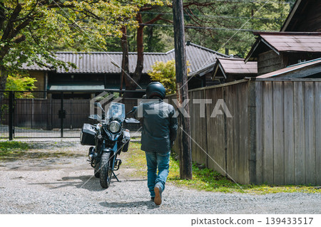 Old wooden houses and motorcycles in Ashio Old wooden houses and motorcycles in Ashio 139433517