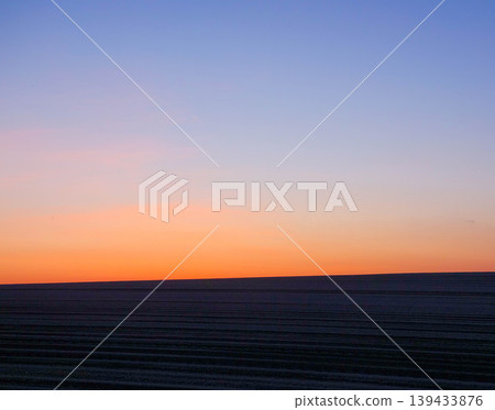 A view of the hills and sky in the magic hour after sunset in Biei, Hokkaido. 139433876