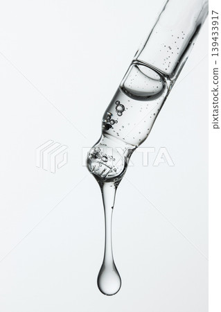 Macro Glass Pipette With Glossy Serum Drop Macro Glass Pipette With Glossy Serum Drop 139433917