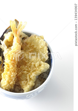 Tempura rice bowl photographed alone against a white background. 139434907
