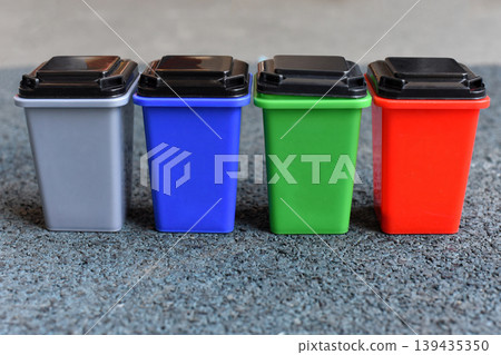 Colorful recycling bins lined up, waste sorting, sustainability 139435350