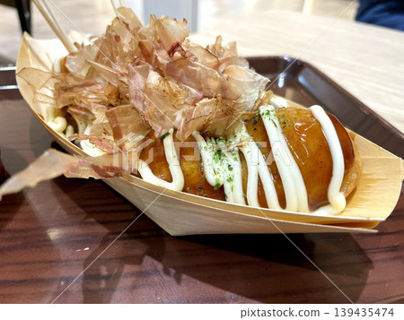 Takoyaki - Plenty of bonito flakes, mayonnaise, sauce, and a diagonal front angle. Takoyaki - Plenty of bonito flakes, mayonnaise, sauce, and a diagonal front angle. 139435474