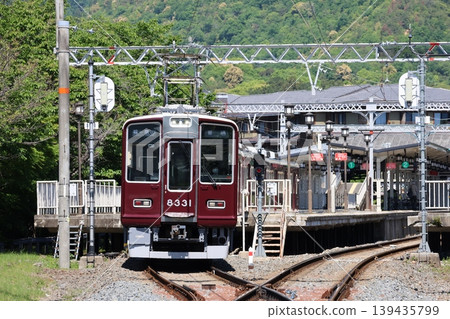 8300 series train departing from Hankyu Arashiyama Station 8300 series train departing from Hankyu Arashiyama Station 139435799