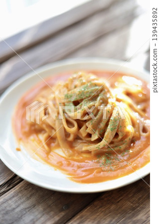 Crab and tomato cream pasta made with flat brown rice noodles (gluten-free noodles) Crab and tomato cream pasta made with flat brown rice noodles (gluten-free noodles) 139435892