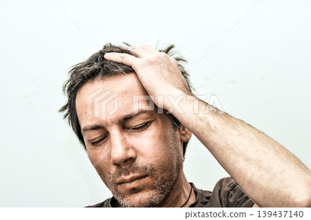 Young man suffering from toothache pain Young man suffering from toothache pain 139437140