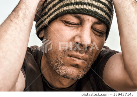 Young man suffering from toothache pain Young man suffering from toothache pain 139437143