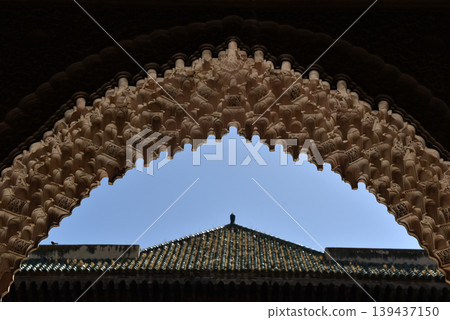 Carved stone gate arch, carved wooden architectural details, Medersa bou Inania, Fez, Morocco 139437150