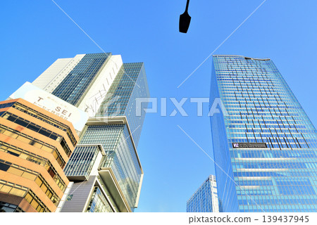 The cluster of skyscrapers around Shibuya Station, undergoing redevelopment, stands out against the blue sky. The cluster of skyscrapers around Shibuya Station, undergoing redevelopment, stands out against the blue sky. 139437945